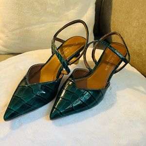 Green faux crocodile leather. Like new; worn only once.